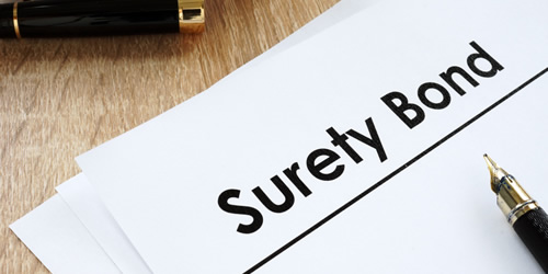 What does a surety bond protect?